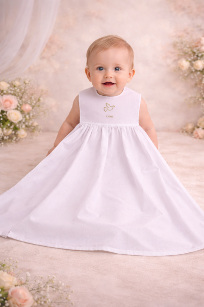 Nahaufnahme Taufaufleger mit Motiv und darunter Name in gold